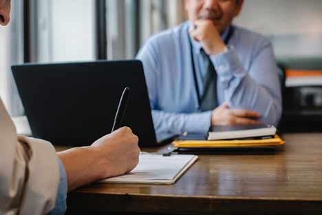 person writing a document