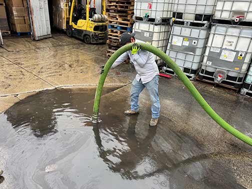a commercial drain cleaning taking place