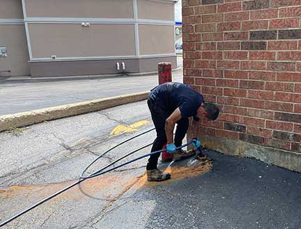 Commercial drain cleaning in Bedford Park Illinois showing industrial plumbing maintenance