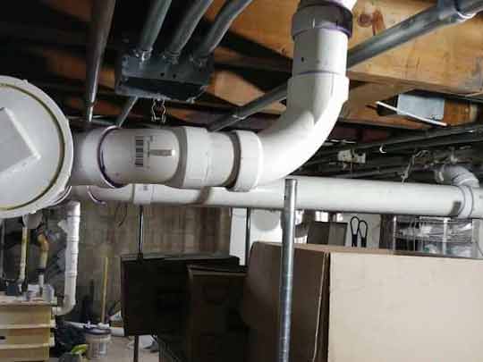 installing an overhead sewer system.