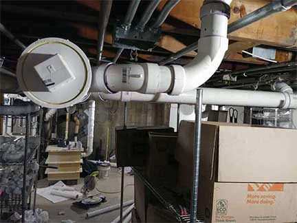 Overhead sewer system in Orland Park Illinois showing flood prevention plumbing upgrade