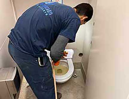 Plumber in Oak Brook Illinois performing plumbing repair and maintenance work