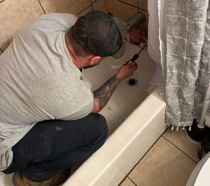 Plumber in Oak Park Illinois performing plumbing repair and maintenance work