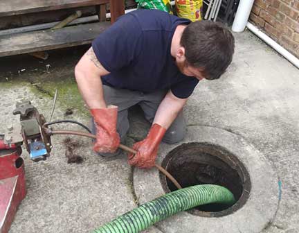Plumber in Riverside Illinois performing plumbing repair and maintenance work