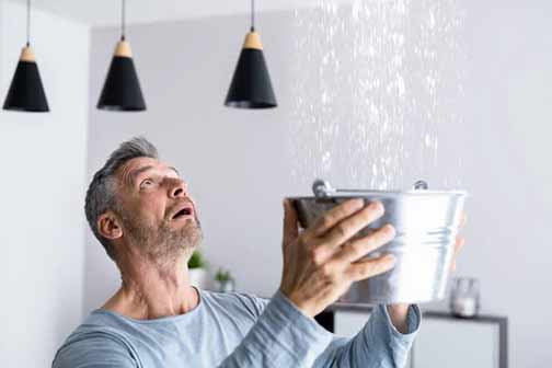 a man facing a plumbing emergency.