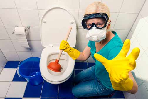 a woman plunging her toilet