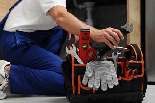 a professional plumber making repairs