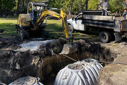 a septic tank replacement taking place in illinois.