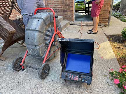 Sewer camera inspection in Chicago Illinois showing live video inside sewer line