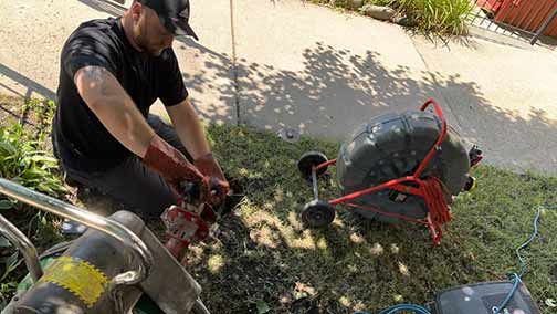 a plumber performing a sewer camera inspection in la grange.