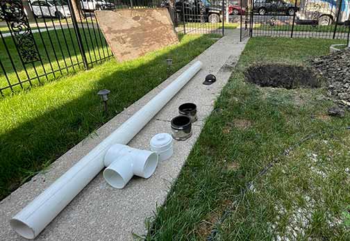 a sewer line repair taking place in downers grove illinois.