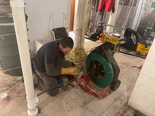 a willowbrook plumber performing a sewer rodding.