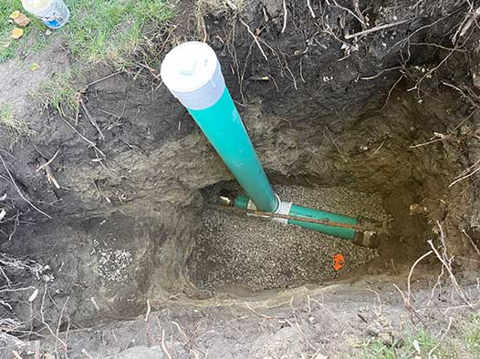 a freshly completed sewer line repair.