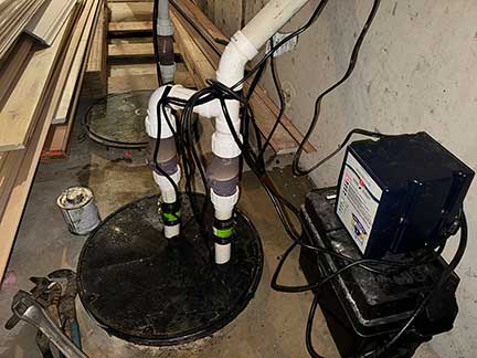 Sump pump replacement in Chicago Illinois showing basement installation work
