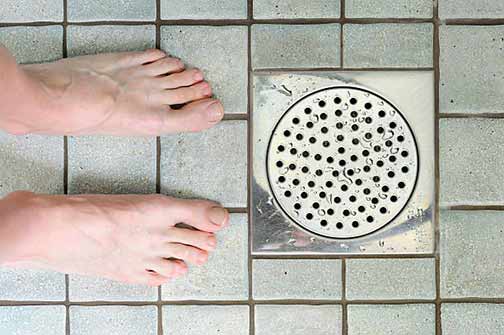 a man with unpleasant odors in his shower drain.