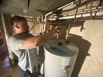 Water heater installation in Oak Park Illinois showing new unit setup