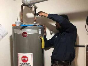 a plumber performing a water heater replacement in naperville illinois.