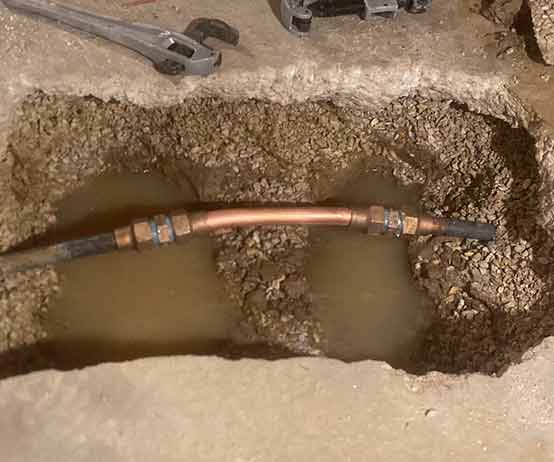 a water line repair being performed.